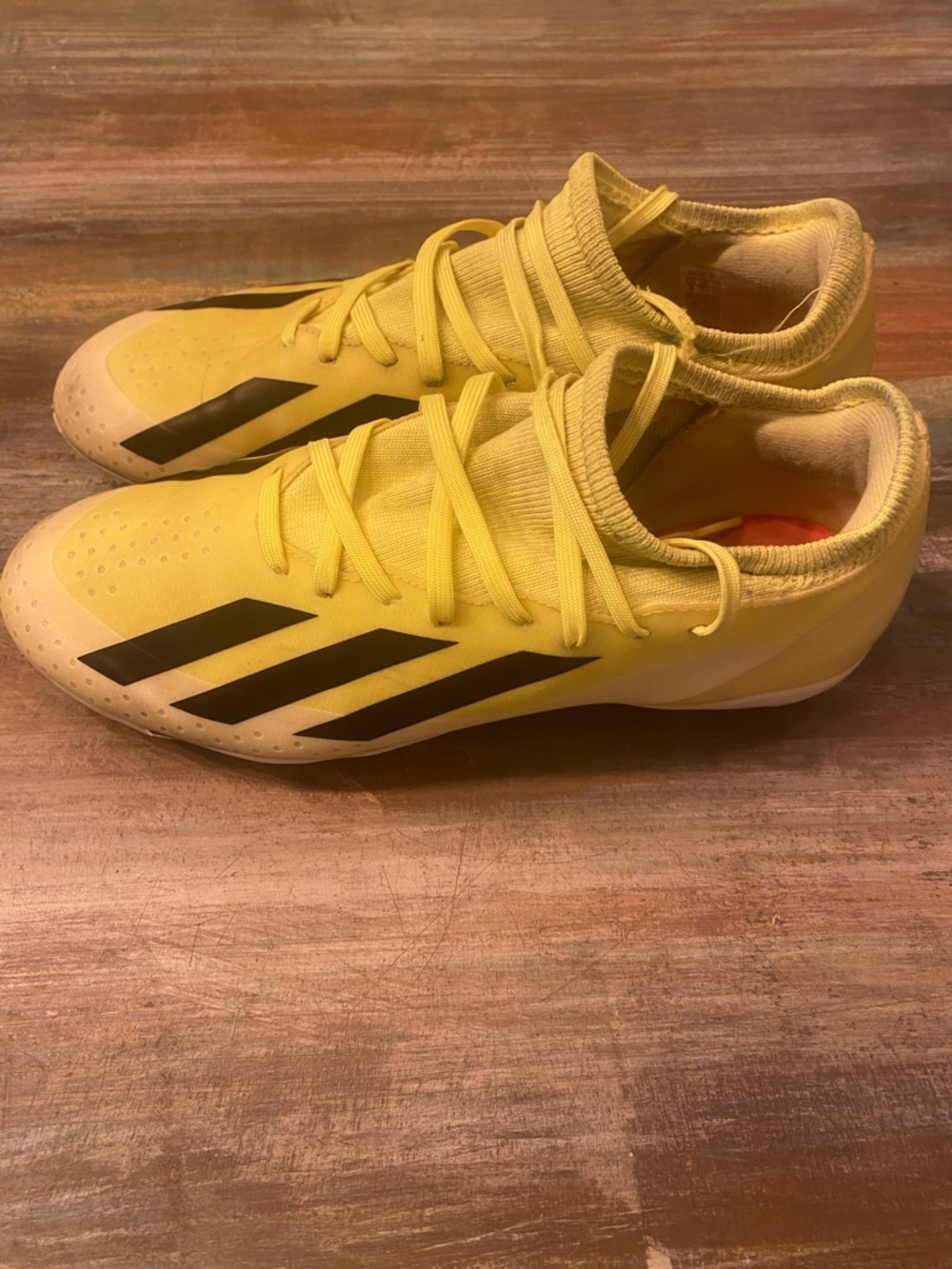 Adidas Yellow men’s Soccer Sneakers with Black Stripes